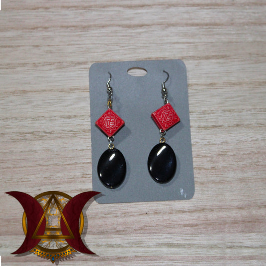 red charm earring